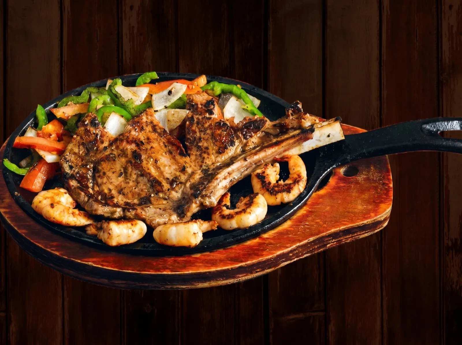 Mi Guadalajara parrillada served at the table — grilled meats the tapatío way